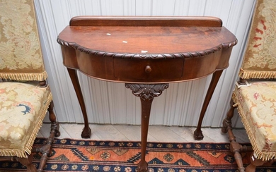 A CHIPPENDALE STYLE SINGLE DRAWER CONSOLE
