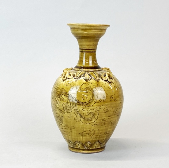 A Chinese Yuan Dynasty style incised olive green glazed pottery vase, H. 21cm.