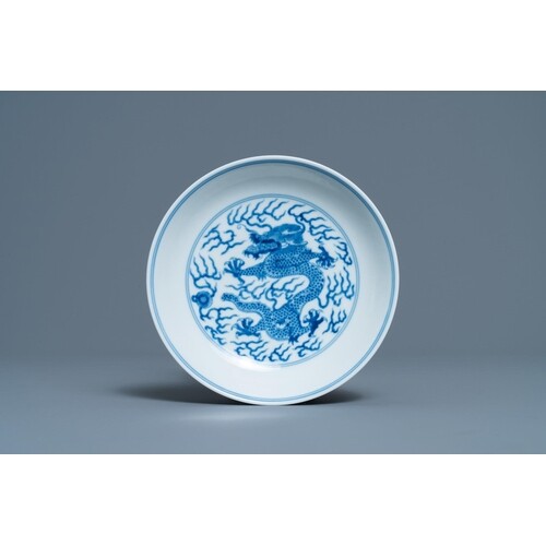 A Chinese blue and white 'dragon' dish, Guangxu mark and of ...