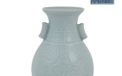 A Chinese celadon porcelain archaistic vase