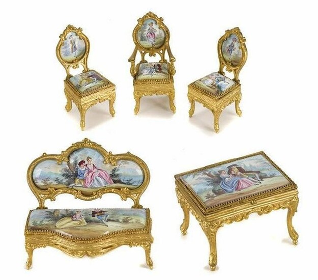 A Continental Gilt Metal And Enamel Suite Of Miniature