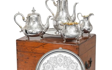 A Four-Piece Victorian Silver Tea and Coffee-Service With Two Salvers En Suite The Tea and Coffee-Service by Daniel and Charles Houle, London, 1864, The Salvers by George John Richards and Edward Charles Brown, London, 1864 and 1865