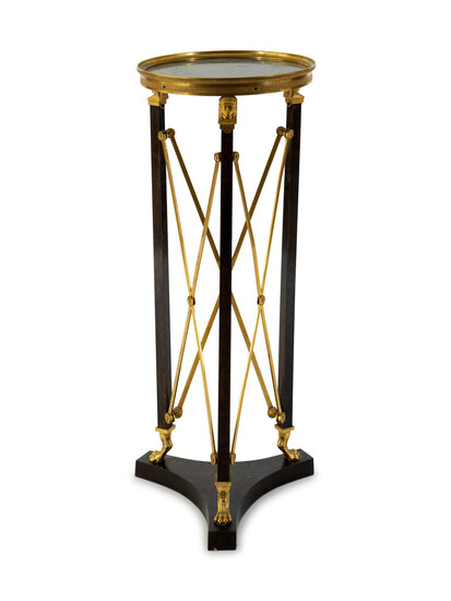A French Empire Style Gilt Bronze and Ebonized Marble Top Pedestal Table