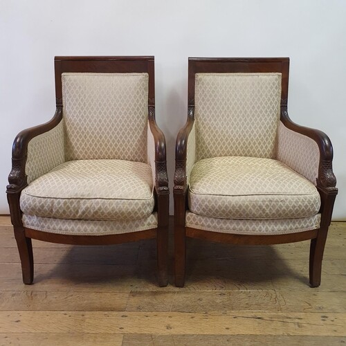 A French Empire style mahogany three piece suite, comprising...