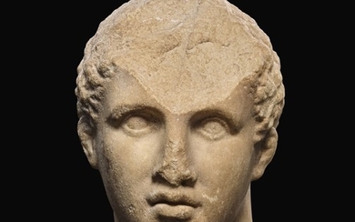 A GREEK MARBLE HEAD OF A YOUTH, 3RD QUARTER OF 4TH CENTURY B.C.