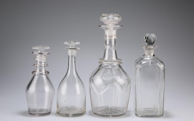A GROUP OF FOUR GEORGIAN AND VICTORIAN GLASS DECANTERS