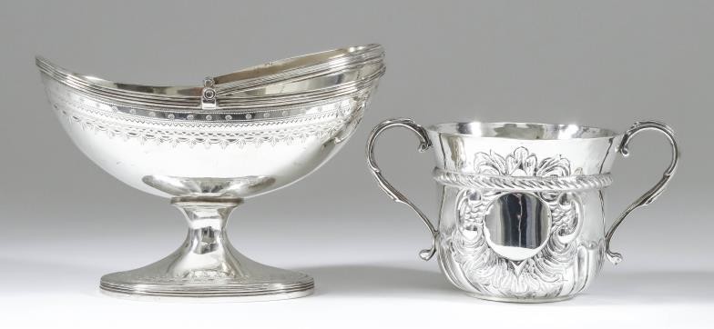 A George III Silver Oval Sugar Basket and a...