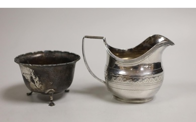 A George III chased silver cream jug, James Mince, London, 1...