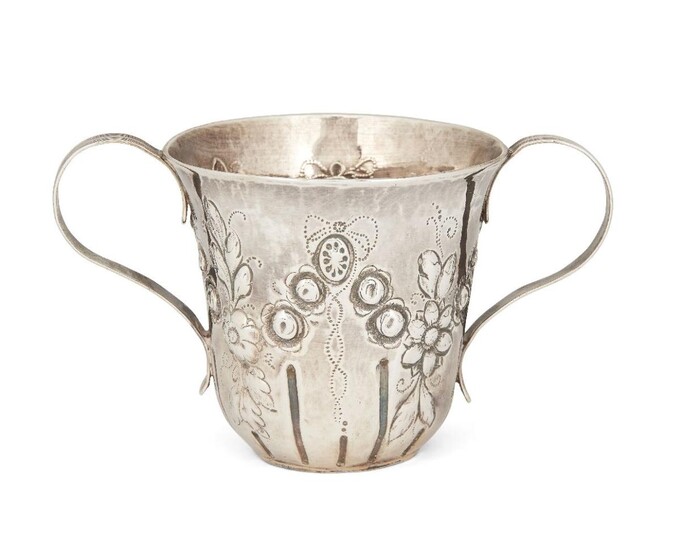 A George III silver porringer cup, London, 1783, maker's mark indistinct, with reeded twin handles and repousse floral garland decoration to body, 7.5cm high, approx. weight 2.8oz