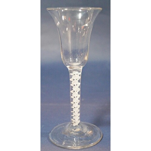 A Georgian wine glass with trumpet shaped bowl and latticino...