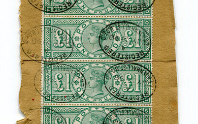 A Great Britain vertical strip of five £1 green tied to piece with oval 1898 registered Leadenh