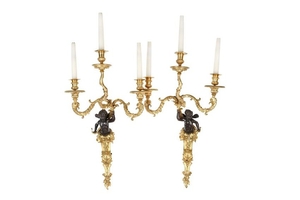 A LARGE PAIR OF LOUIS XVI STYLE GILT AND PATINATED
