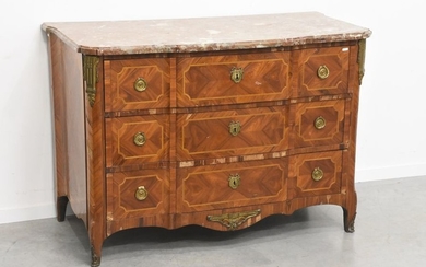 A Louis XVI period marquetry chest of drawers,...
