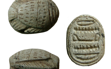 A New Kingdom Egyptian steatite scarab with fish
