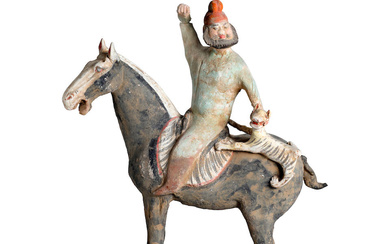 A PAINTED POTTERY HORSE AND 'FOREIGNER' RIDER Tang dynasty