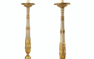 A PAIR OF ITALIAN GREY-PAINTED GILTWOOD AND GILT-COMPOSITION TORCHERES, CIRCA 1805-1825, NOW MOUNTED AS LAMPS