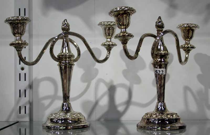 A PAIR OF SILVER PLATED CANDELABRA