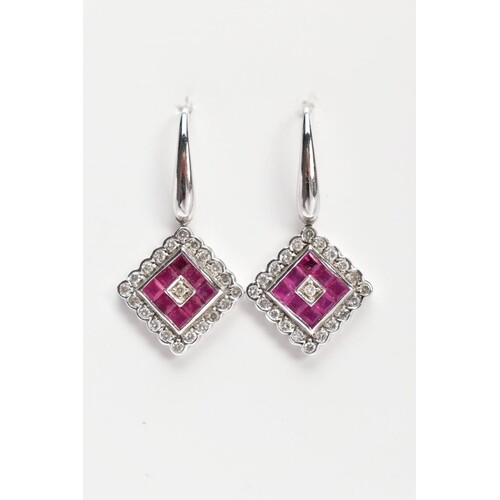 A PAIR OF WHITE METAL, DIAMOND AND RUBY DROP EARRINGS, each ...