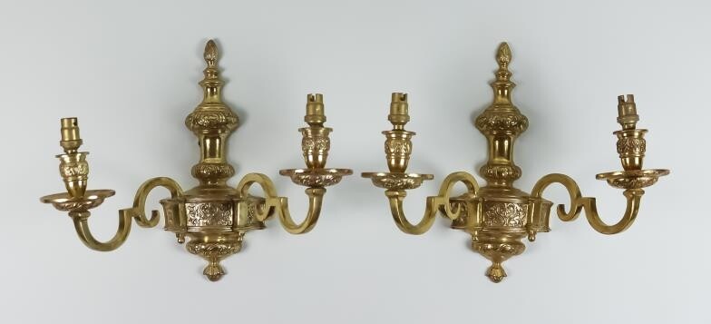 A Pair of Cast Brass Twin Wall Lights of...