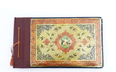 A Persian photograph album with lacquered boards, one decora...