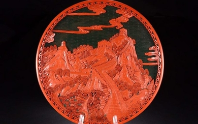 A RED LACQUER PLATE CARVED WITH GREAT WALL