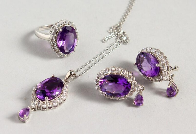 A SILVER AND AMETHYST SET, EARRINGS, PENDANT AND RING.