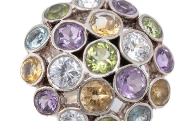 A SILVER GEMSET RING; 24.5mm wide dome top collet set with round cut amethyst, peridot, citrine, topaz and zirconia, (some chips), s...