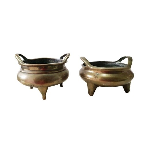 A Similar Pair Of Chinese Gilt Bronze Tripod Censers Each Ma...