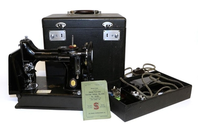 A Singer Portable Sewing Machine No 221K1, together with accessories...