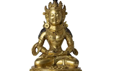 A Sino-Tibetan gilt bronze Bodhisattva 18th century The heavily casted figure seated...