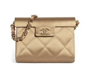 A TAN QUILTED SATIN EVENING BAG WITH GOLD HARDWARE, CHANEL, 2004