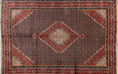 A Tabriz fish design hand knotted wool rug, 6’5” x 9’3”