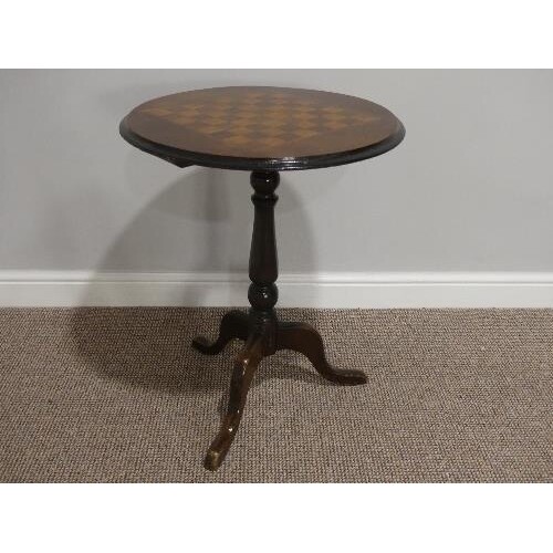 A Victorian walnut inlaid Tripod Table, the top inlaid with ...