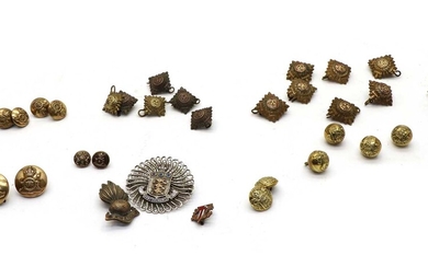 A collection of military uniform buttons