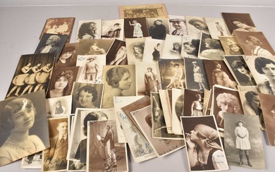 A collection of signed postcards and photographs