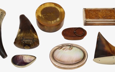A collection of snuff mulls and boxes