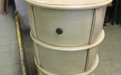 A cream painted circular cabinet with three drawersCondition Report There...