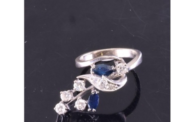 A diamond & sapphire cluster ring finger size J-K