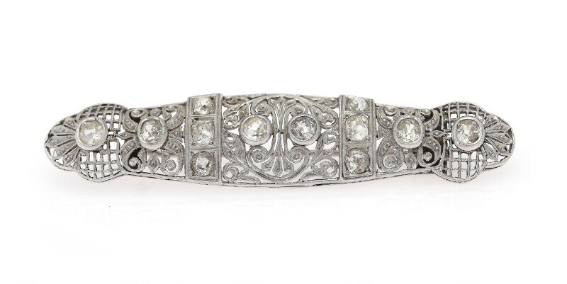 NOT SOLD. A diamond brooch set with numerous old-cut diamonds weighing a total of app....