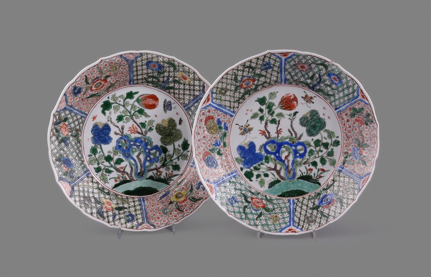 A fine pair of Chinese porcelain famille verte circular lobed plates