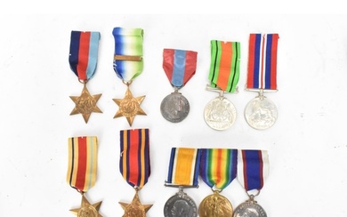 A group of WWI and WWII medals to include a three medal WW1 ...