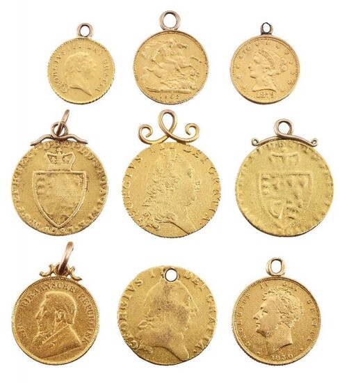 A group of nine pendant mounted gold...