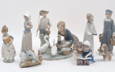 A group of seven Lladro porcelain figures, 20th century, to include a group of a girl feeding two swans, 17cm high, a young water carrier, 22cm high, a young fisherman, 21.5cm high, a young girl in a nightdress holding a candle, 21cm high, a young...