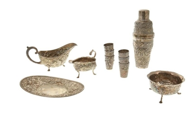 A group of sterling silver repousse table items