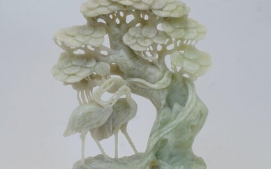A large Chinese serpentine 'Song He Yan Nian' carving, 20th century, carved with two cranes under a pine tree sitting on fitted stand, 47cm high including stand, with a fitted embroidered box