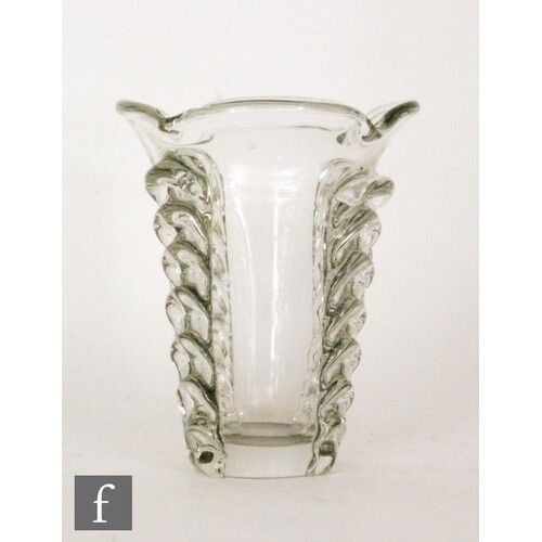 A large mid 20th Century clear crystal glass vase designed b...