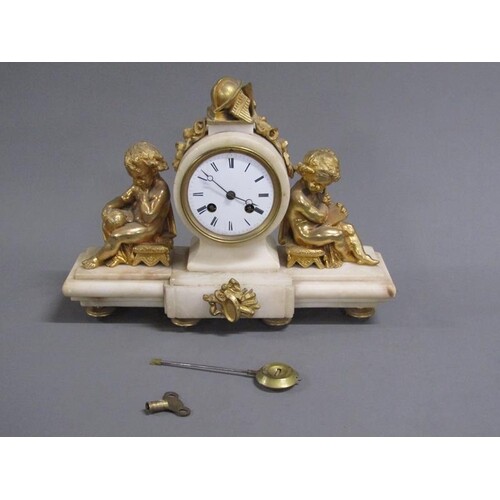 A late 19c French mantel clock in white alabaster drum head ...