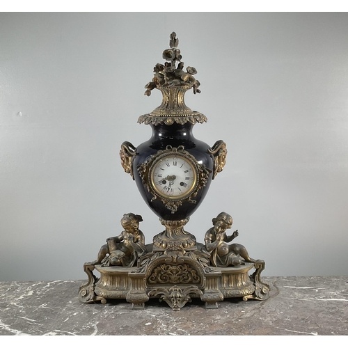 A late 19th century French gilt metal mantle clock, movement...