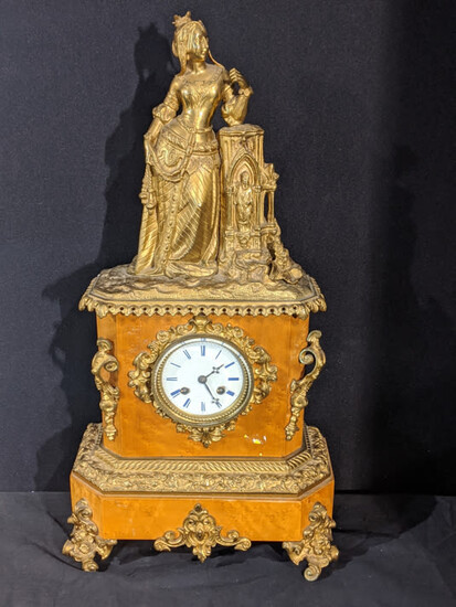 A late 19th century French ormolu mantel clock, burr...