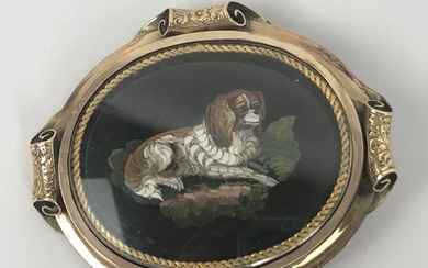 A late 19th century micro-mosaic brooch, decorated a Spaniel...